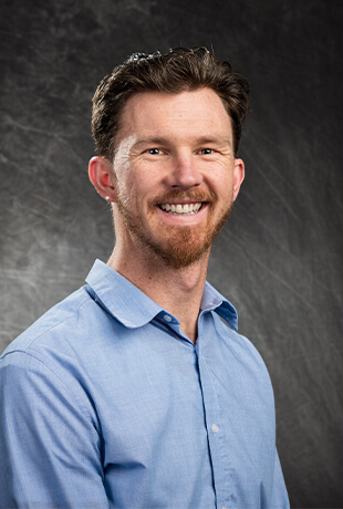 Portrait of Dr. Noah Volz, chiropractor in Ashland, Oregon.